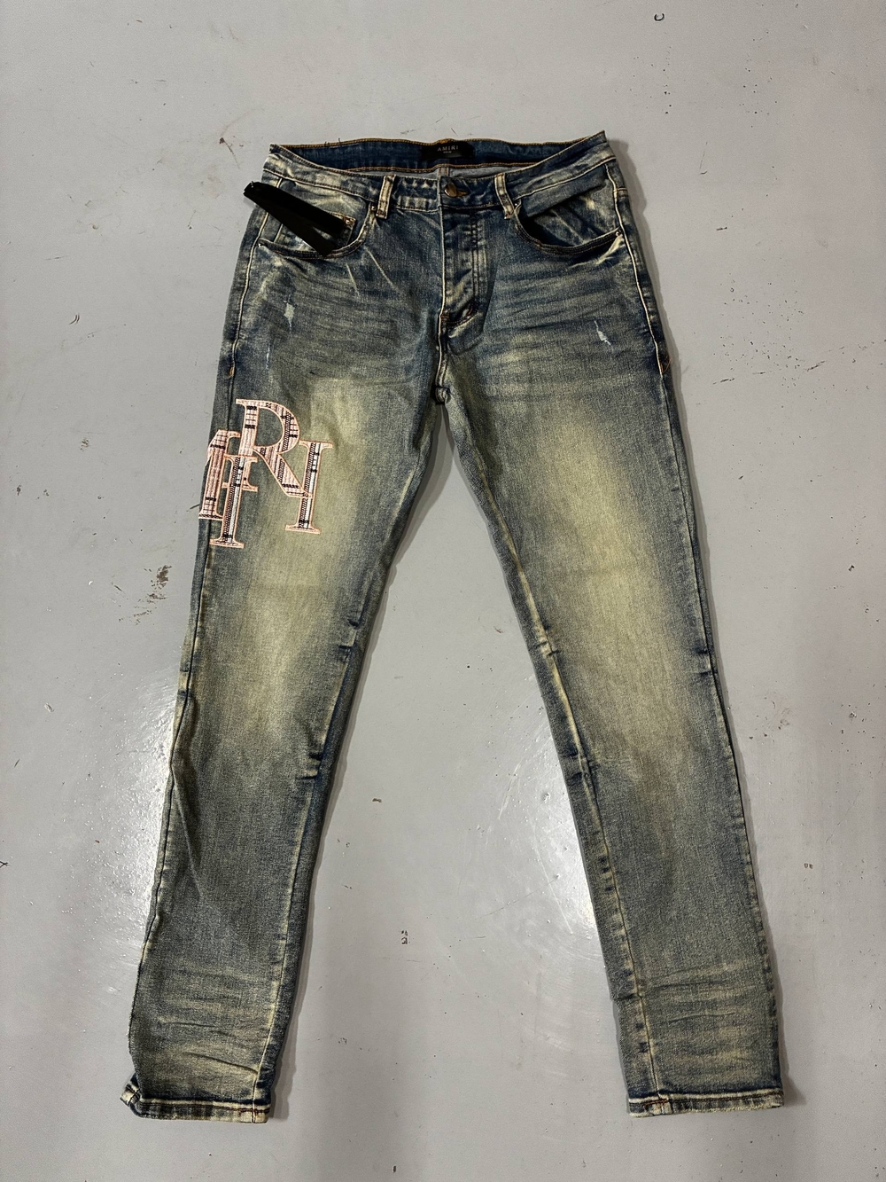 AMIRI Washed Blue Slim Straight Jeans with Pink RH Patch